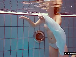 nice ginger-haired plays nude underwater